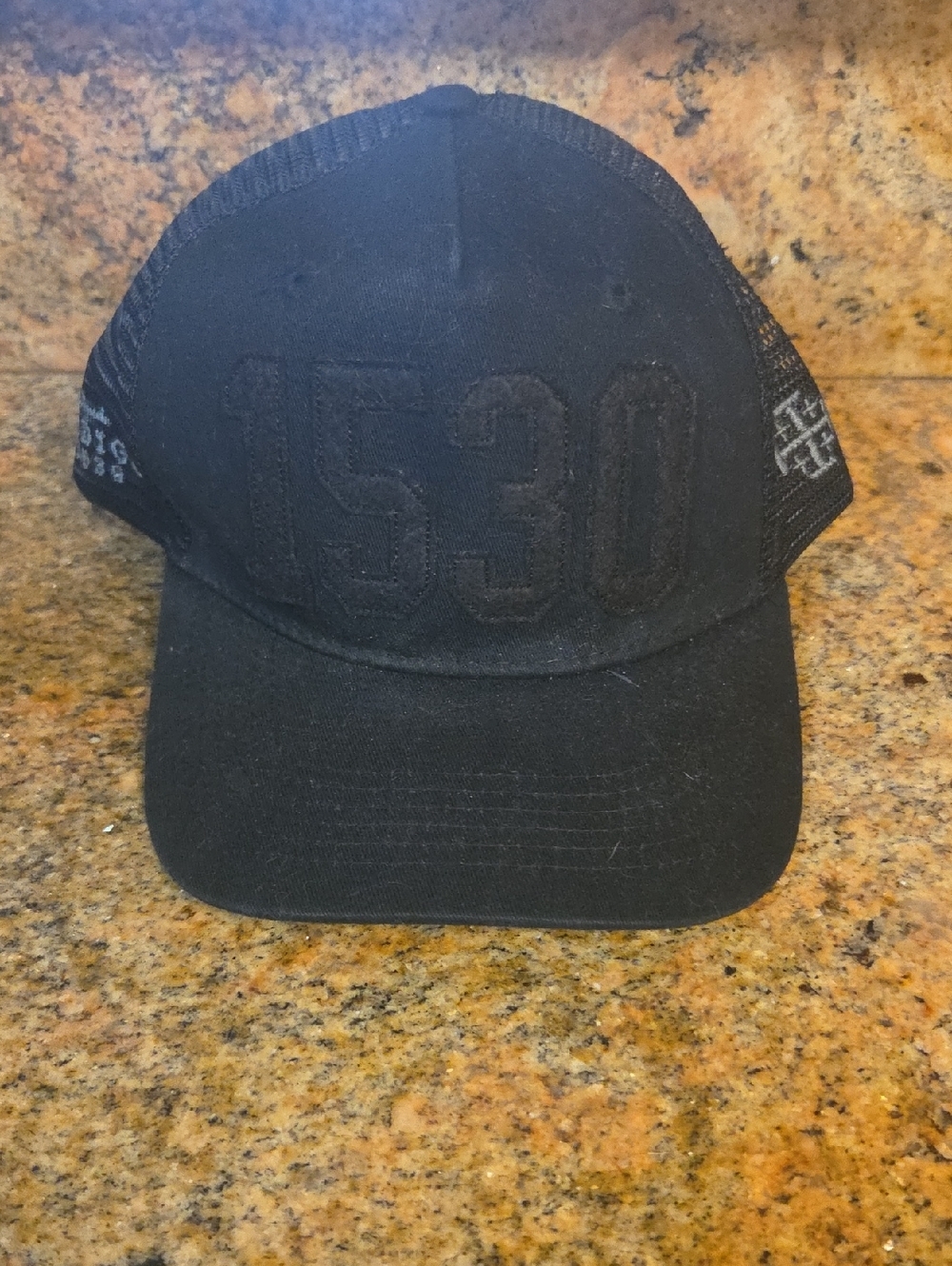 Black Trucker Cap with 1530 Embroidered Front